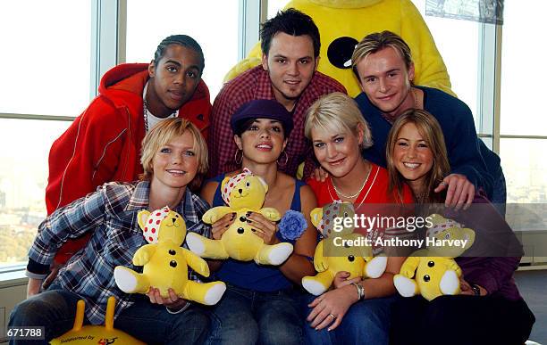 British pop band S Club 7 Bradley Mcintosh, Paul Cattermolle, John Lee, Hannah Spearritt, Tina Barrett, Joe Omeara and Rachael Stephens pose for...