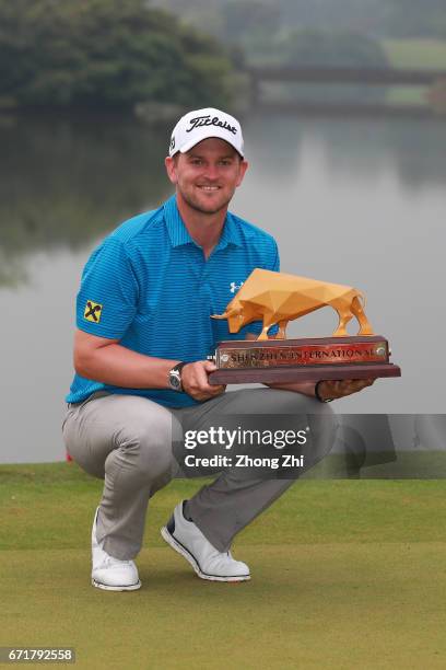 Bernd Wiesberger of Austria poses with the trophy after winning the Shenzhen International at Genzon Golf Club on April 22, 2017 in Shenzhen, China.