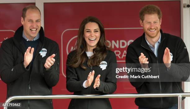 Prince William, Duke of Cambridge, Catherine, Duchess of Cambridge and Prince Harry encourage runners during the 2017 Virgin Money London Marathon on...