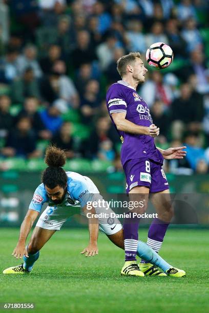 Rostyn Griffiths of the Glory and Osama Malik of Melbourne City contest the ball during the A-League Elimination Final match between Melbourne City...