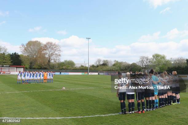 Teams observe a minutes silence for Ugo Ehiogu during the FA Women's Premier League Reserve League Cup Final match between Tottenham Hotspur Reserves...