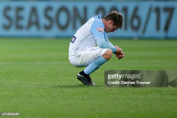 Nick Fitzgerald of Melbourne City slumps to the ground after his teams season ending loss in the A-League Elimination Final match between Melbourne...