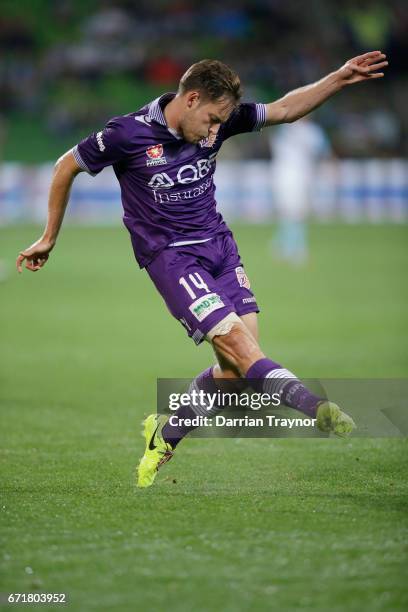 Chris Harold of Perth Glory kicks the ball during the A-League Elimination Final match between Melbourne City FC and the Perth Glory at AAMI Park on...