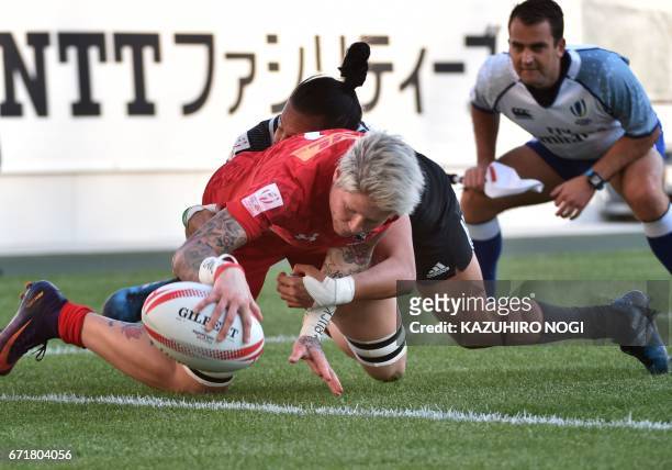Canada's Jennifer Kish scores a try against New Zealand during the final at the World Rugby Women's Sevens Series in Kitakyushu, Fukuoka prefecture...