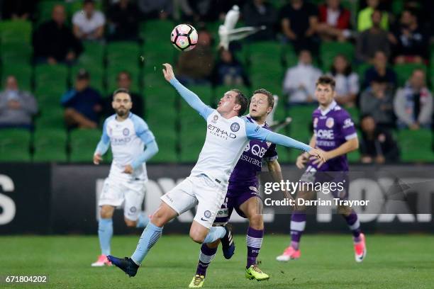 Neil Kilkenny of Melbourne City and Chris Harold of Perth Glory compete for the ball during the A-League Elimination Final match between Melbourne...