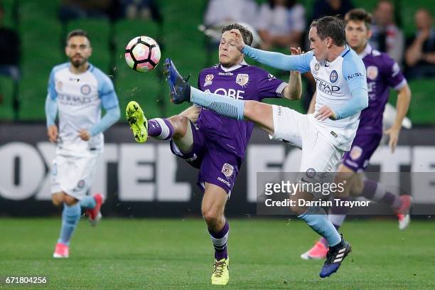 Neil Kilkenny of Melbourne City and Chris Harold of Perth Glory compete for the ball during the A-League Elimination Final match between Melbourne...