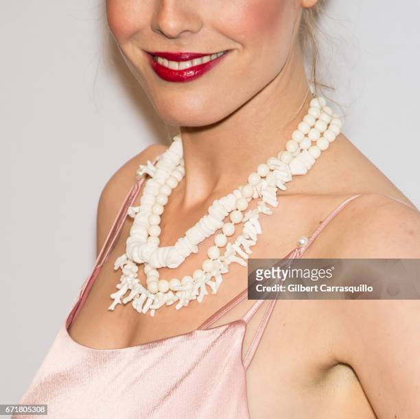 Sarah Herpich, necklace detail, attend the 'House of Z' Premiere during 2017 Tribeca Film Festival at SVA Theatre on April 22, 2017 in New York City.