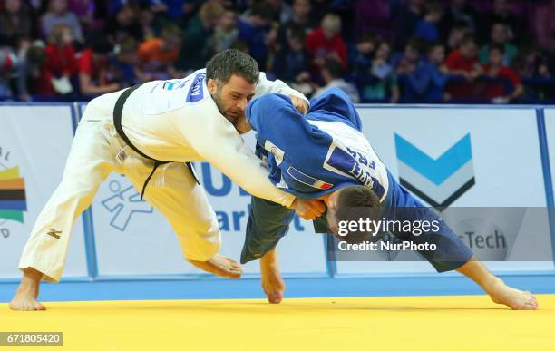 French Cyrille Maret fights with Elkhan Mammadov from Azerbaijan during men under 100kg competition during the European Judo Championship in Warsaw,...