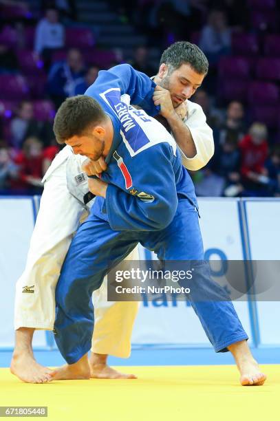 French Cyrille Maret fights with Elkhan Mammadov from Azerbaijan during men under 100kg competition during the European Judo Championship in Warsaw,...