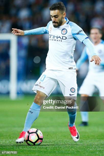 Anthony Caceres of Melbourne City runs with the ball during the A-League Elimination Final match between Melbourne City FC and the Perth Glory at...