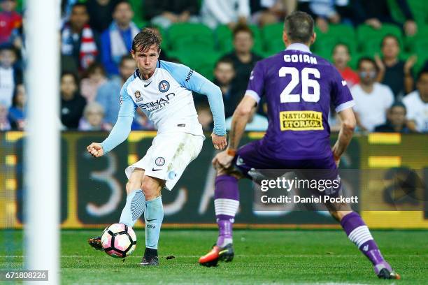 Nick Fitzgerald of Melbourne City crosses the ball during the A-League Elimination Final match between Melbourne City FC and the Perth Glory at AAMI...