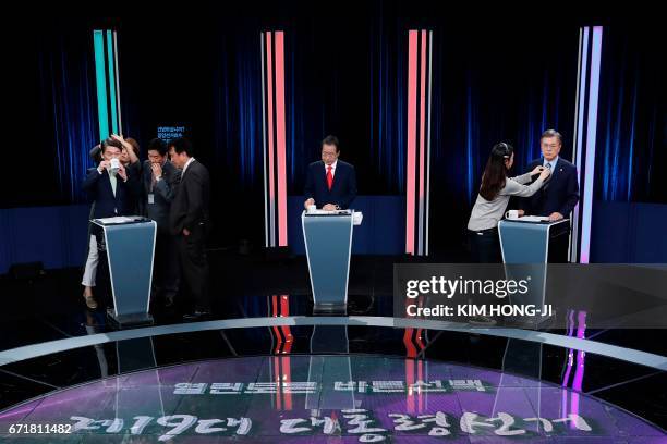 South Korean presidential candidates Ahn Cheol-soo of the People's Party, Hong Joon-pyo of the Liberty Korea Party and Moon Jae-in of the Democratic...