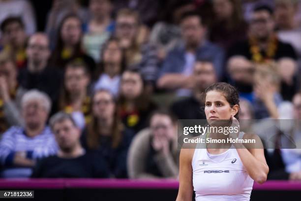 Julia Goerges of Germany reacts after missing a point against Lesia Tsurenko of Ukraine during the FedCup World Group Play-Off match between Germany...