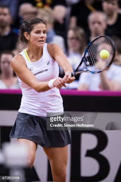 Julia Goerges of Germany returns the ball against Lesia Tsurenko of Ukraine during the FedCup World Group Play-Off match between Germany and Ukraine...
