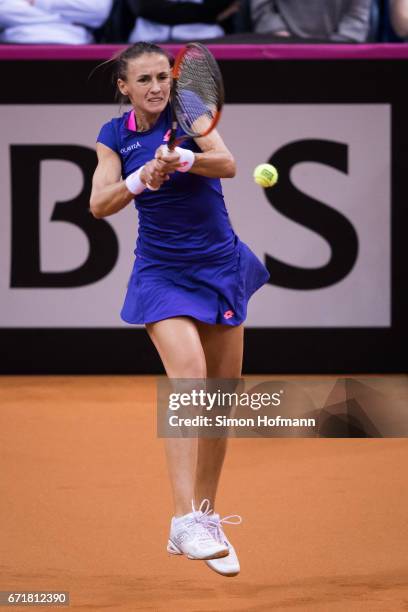 Lesia Tsurenko of Ukraine returns the ball against Julia Goerges of Germany during the FedCup World Group Play-Off match between Germany and Ukraine...