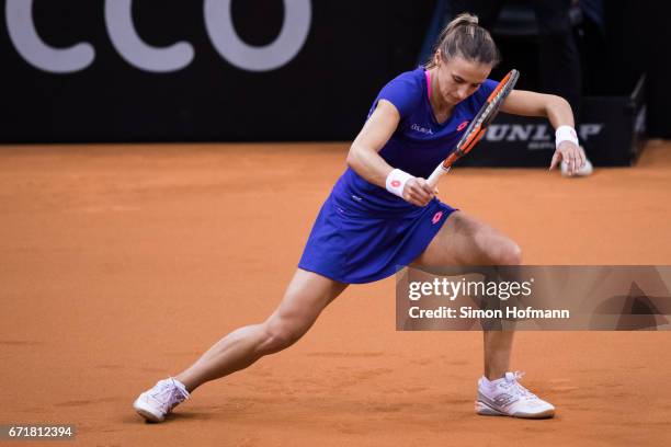 Lesia Tsurenko of Ukraine reacts after missing a point against Julia Goerges of Germany during the FedCup World Group Play-Off match between Germany...