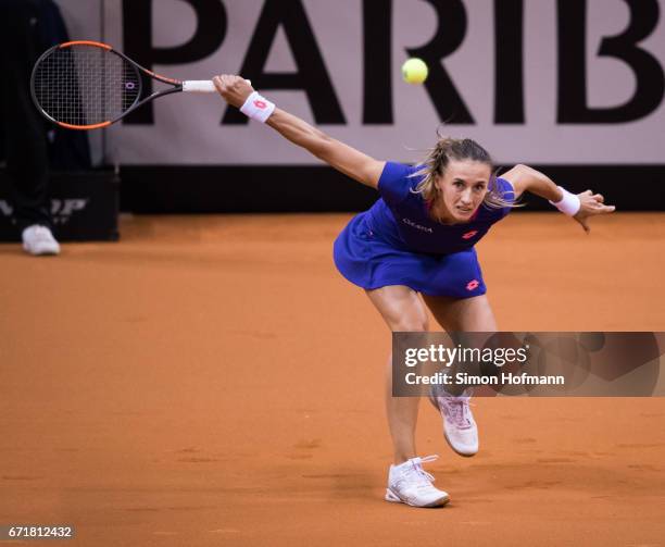 Lesia Tsurenko of Ukraine returns the ball against Julia Goerges of Germany during the FedCup World Group Play-Off match between Germany and Ukraine...