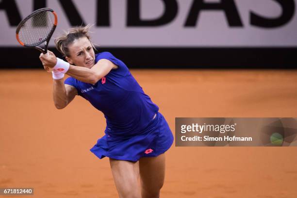Lesia Tsurenko of Ukraine returns the ball against Julia Goerges of Germany during the FedCup World Group Play-Off match between Germany and Ukraine...