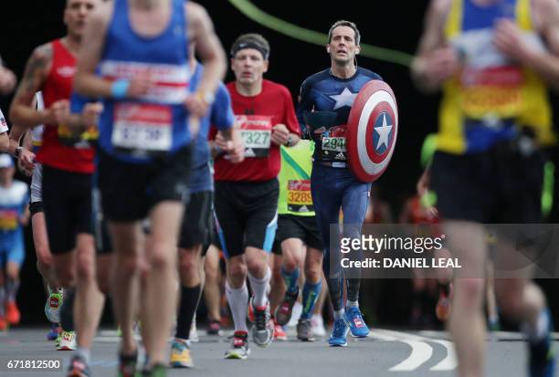 Runners participate in the London marathon on April 23, 2017 in London.