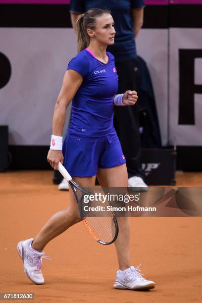 Lesia Tsurenko of Ukraine celebrates a point against Julia Goerges of Germany during the FedCup World Group Play-Off match between Germany and...