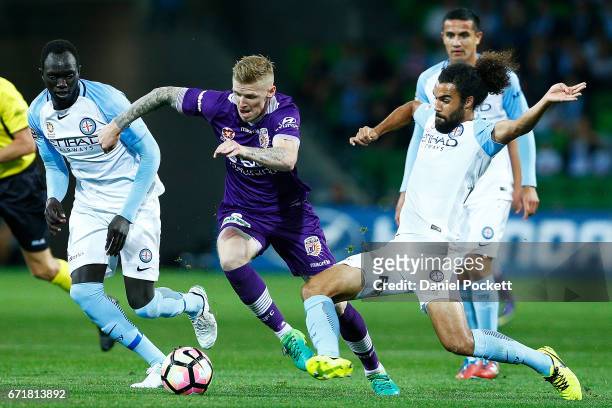 Osama Malik of Melbourne City and Andy Keogh of the Glory contest the ball during the A-League Elimination Final match between Melbourne City FC and...
