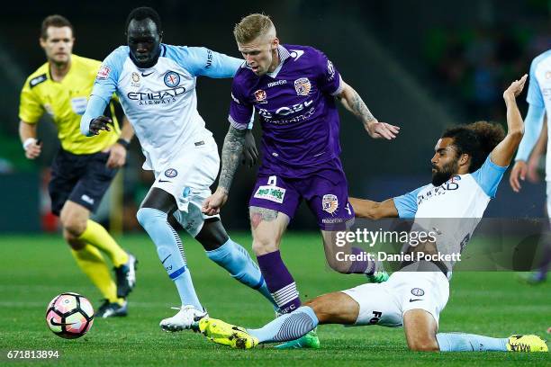 Osama Malik of Melbourne City and Andy Keogh of the Glory contest the ball during the A-League Elimination Final match between Melbourne City FC and...