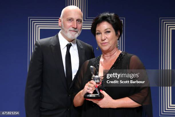 Vincent Sheehan and Victoria Madden pose with the Logie Award for Most Outstanding Miniseries or Telemovie 'The Kettering Incident' during the 59th...