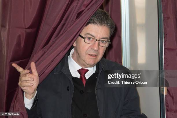 Presidential Candidate Jean Luc Melenchon leaves a polling booth as he votes in the first round of 2017 French presidential election in a polling...