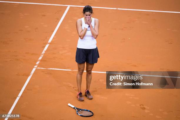 Julia Goerges of Germany celebrates victory against Lesia Tsurenko of Ukraine during the FedCup World Group Play-Off match between Germany and...