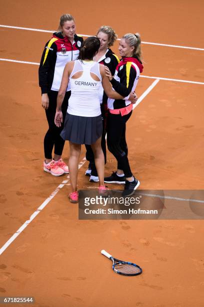 Team mates of Germany celebrate victory during the FedCup World Group Play-Off match between Germany and Ukraine at Porsche Arena on April 23, 2017...