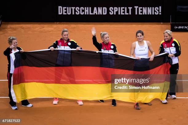 Laura Siegmund, Carina Witthoeft, Angelique Kerber, Julia Goerges and Barbara Rittner of Germany celebrate victory during the FedCup World Group...