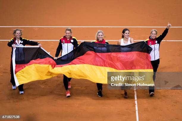 Laura Siegmund, Carina Witthoeft, Angelique Kerber, Julia Goerges and Barbara Rittner of Germany celebrate victory during the FedCup World Group...