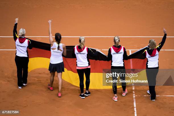 Laura Siegmund, Carina Witthoeft, Angelique Kerber, Julia Goerges and Barbara Rittner of Germany celebrate victory during the FedCup World Group...