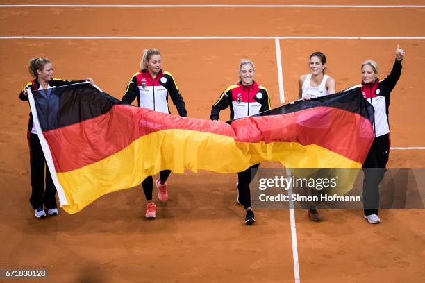 Laura Siegmund, Carina Witthoeft, Angelique Kerber, Julia Goerges and Barbara Rittner of Germany celebrate victory during the FedCup World Group...