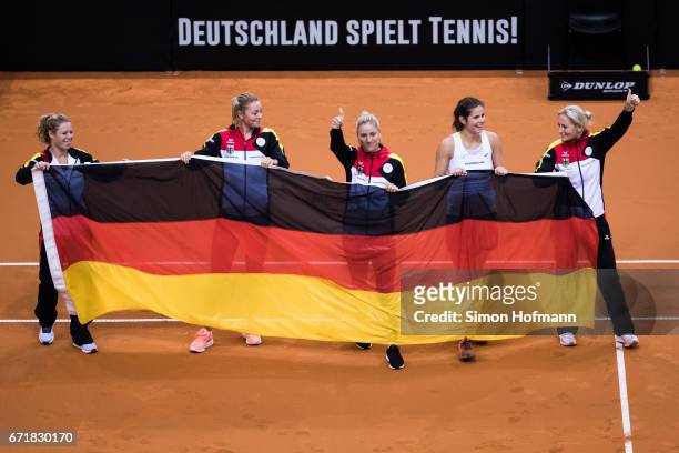 Laura Siegmund, Carina Witthoeft, Angelique Kerber, Julia Goerges and Barbara Rittner of Germany celebrate victory during the FedCup World Group...