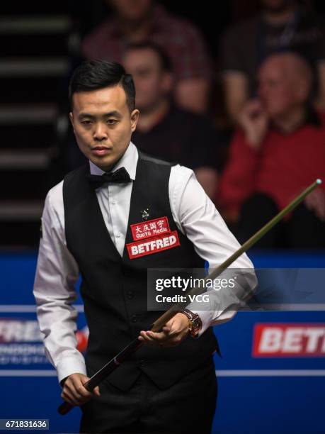 Marco Fu of Chinese Hong Kong reacts during his second round match against Neil Robertson of Australia on day nine of Betfred World Championship 2017...