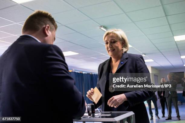 Marine Le Pen , National Front Party Leader and candidate for the 2017 French Presidential Election votes in the first round of the election at the...
