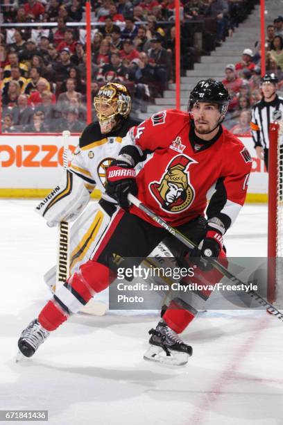 Alexandre Burrows of the Ottawa Senators skates against the Boston Bruins as Tuukka Rask of the Boston Bruins defends the net in Game Five of the...