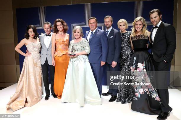 The cast of A Place to Call Home poses with the Logie Award for Most Outstanding Drama Series during the 59th Annual Logie Awards at Crown Palladium...