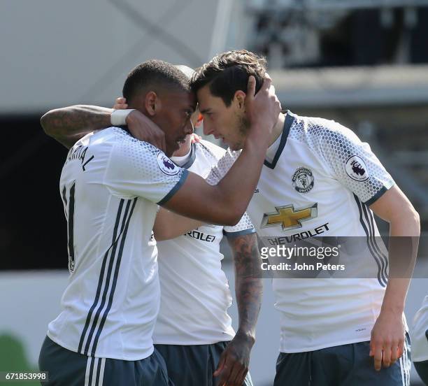 Anthony Martial of Manchester United celebrates scoring their first goal during the Premier League match between Burnley and Manchester United at...