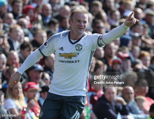 Wayne Rooney of Manchester United celebrates scoring their second goal during the Premier League match between Burnley and Manchester United at Turf...