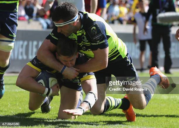 David Strettle of Clermont Auvergne, scores their second try despite being held by Fergus McFadden during the European Rugby Champions Cup semi final...
