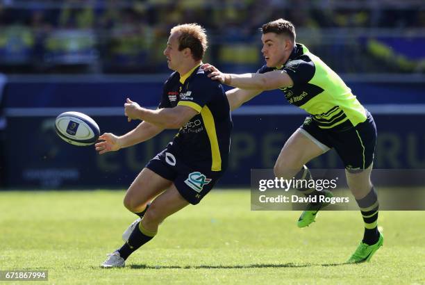 Nick Abendanon of Clermont Auvergne off loads the ball during the European Rugby Champions Cup semi final match between ASM Clermont Auvergne and...