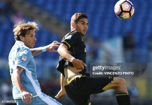 Palermo's midfielder from Bulgaria Ivaylo Chocev vies with Lazio's midfielder from Argentina Lucas Biglia during the Italian Serie A football match...