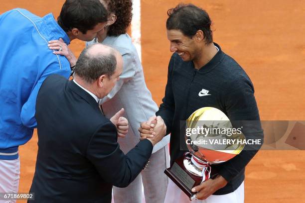 Spain's tennis player Rafael Nadal shakes hands with Prince Albert II of Monaco during the prize ceremony after winning the Monte-Carlo ATP Masters...