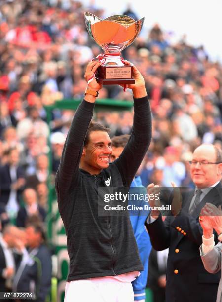 Rafael Nadal of Spain holds aloft his winners trophy after his straight set victory against Albert Ramos-Vinolas of Spain in the final on day eight...