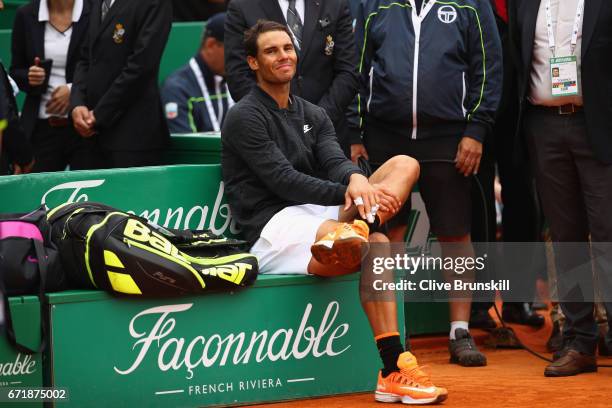 Rafael Nadal of Spain relaxes before the trophy presentation after his straight set victory against Albert Ramos-Vinolas of Spain in the final on day...