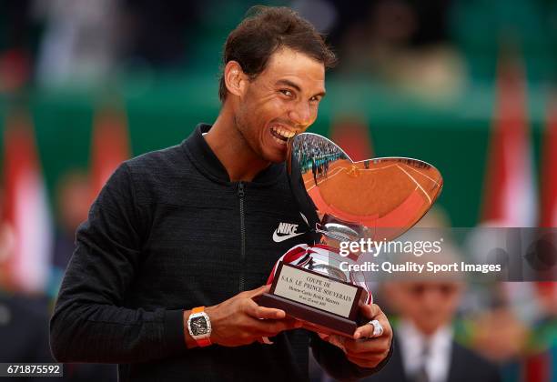 Rafael Nadal of Spain celebrates with the winner's trophy after defeating Albert Ramos-Vinolas of Spain in the final during day eight of the ATP...