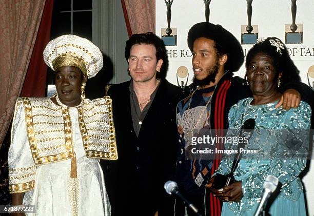 Rita Marley, Bono, Ziggy Marley and Cedella Marley-Booker attend the 1994 Rock and Roll Hall of Fame Induction Ceremony circa 1994 in New York City.