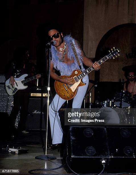 Lenny Kravitz performs at the Rock N' Rule Benefit Gala for AmFar hosted by Versace circa 1992 in New York City.